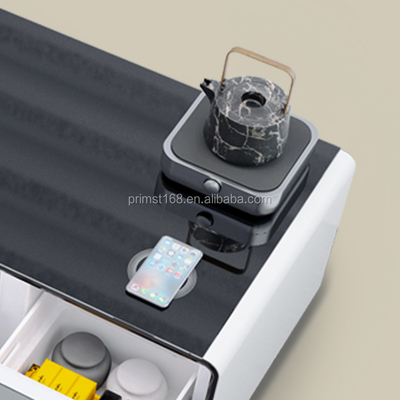 Tavolo da caffè pieghevole in salotto con caricabatterie wireless e frigorifero con due porte USB